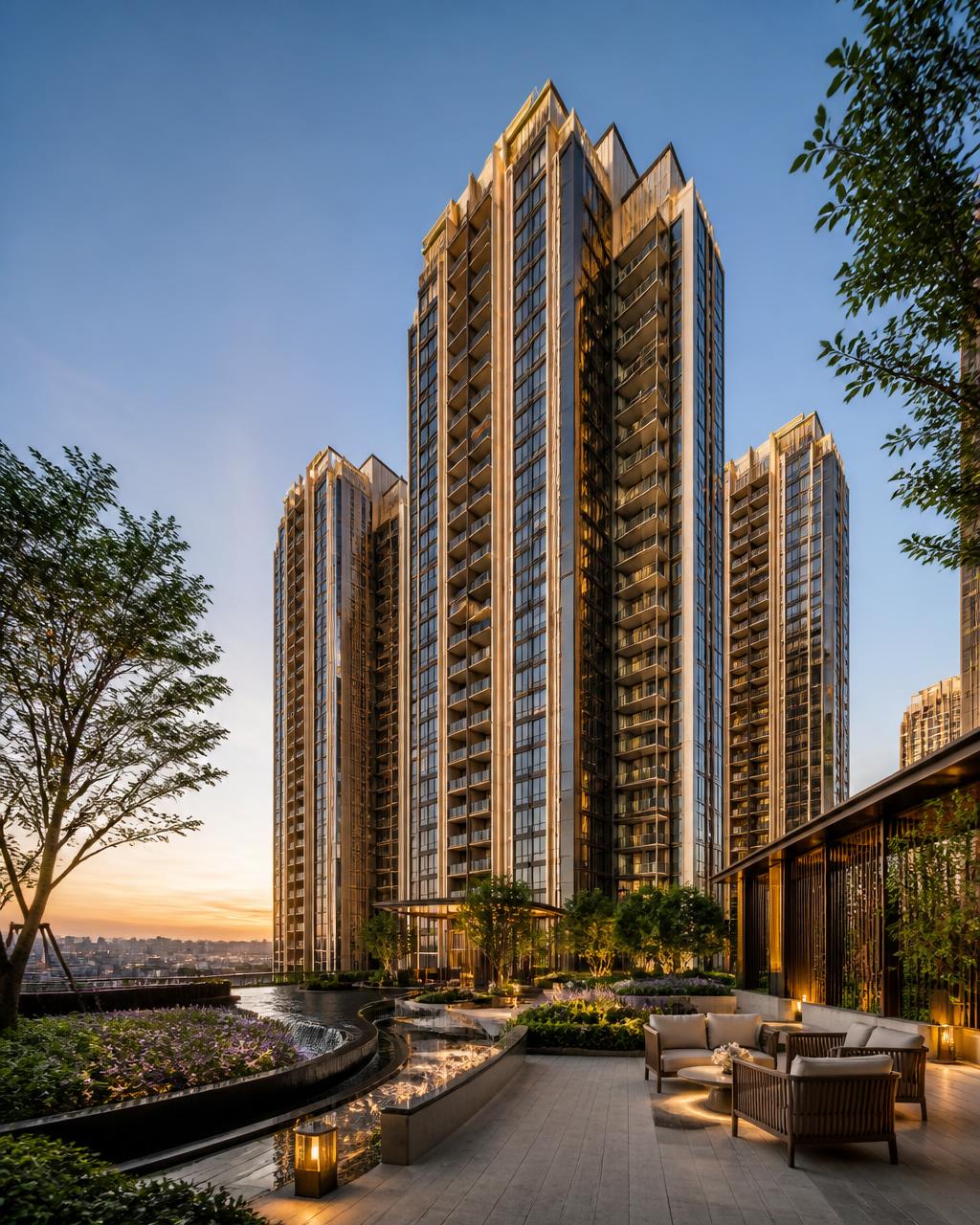 Sunteck Sky Park towers rising above a landscaped elevated podium at golden hour